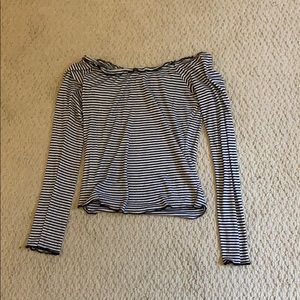 Long sleeve off the shoulder shirt.